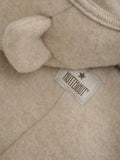 Baby jumpsuit Huttelihut - Merino wool Camel Melange