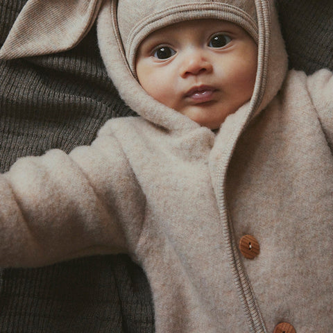 Baby jumpsuit Huttelihut - Camel melange 100% merino wol