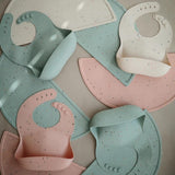 Slabbetje Mushie - cambridge Blue Confetti